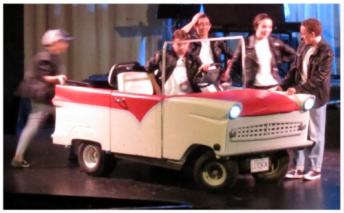 (Image: Gang Members Admire the `Greased Litenin'
 Automobile)