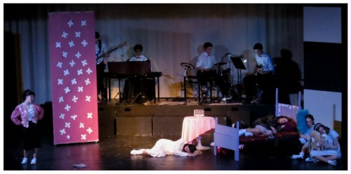 (Image: One Cast Member Sings aside during
 the Girls' Slumber Party)