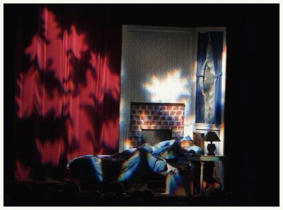 (Image: Patrick sleeps as a Snowflake Projection whirls
around him)