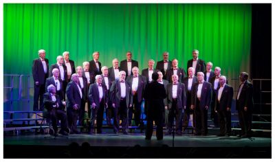 (Image: A Quartet Performs between Partially Closed Curtains)