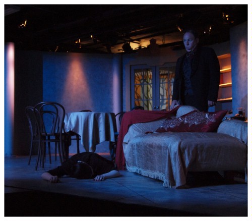 (Image: A Woman Lies Dead on the Floor While
   the House Owner Looks On)