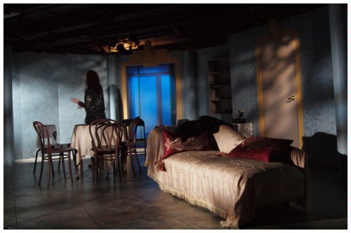 (Image: An Actor Wanders Around the Darkened House)