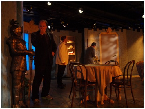 (Image: The House Owner with a Tobacco Pipe Eyes a
   Suit of Armor)