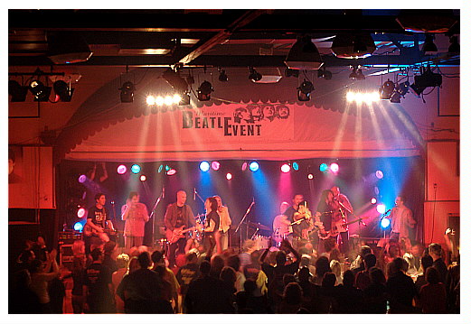 (Image: Beams Radiate Downward into the Crowd)