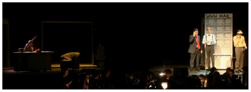 (Image: Biggley is now Knitting while Frump and Finch Speak
  to the Mail Room's Head Clerk)