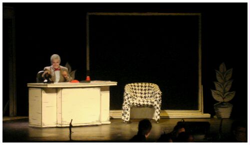 (Image: Biggley sits Alone at his Desk)