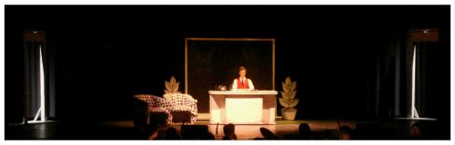 (Image: Long Shot of Finch's New Office with Finch at
  his Desk)