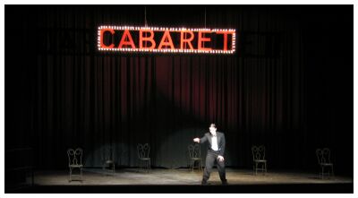 (Image: The MC Introduces the Show)