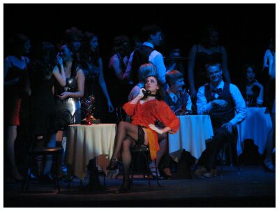 (Image: Closeup of Sally Speaking via Table Phone to Cliff)