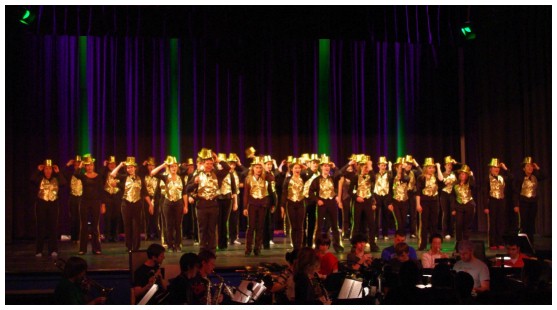 (Image: The Cast in Gold Lame Vests and Hats)