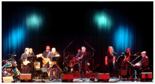 (Image: Tom is Highlighted for his Saxophone Break)