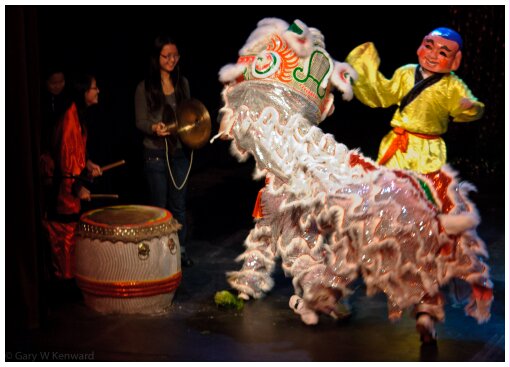 (Image: Two Percussionists Keep Beat while a Dragon and Dancer
   Perform)