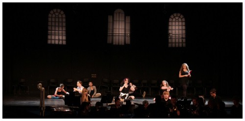 (Image: Students Sit Around Awaiting the Start
   of Class)