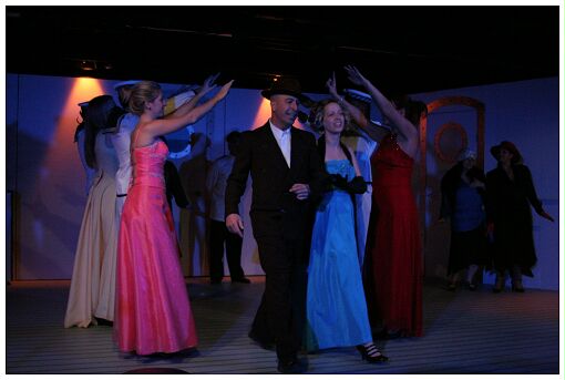 (Image: Hope and Billy Pass Under the Upstretched Arms of the Chorus)