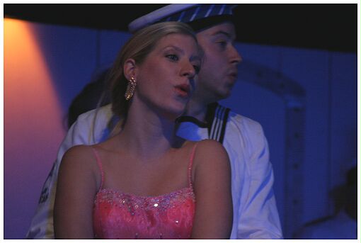 (Image: A Closeup of Two of the Chorus Bathed in Moonlight)