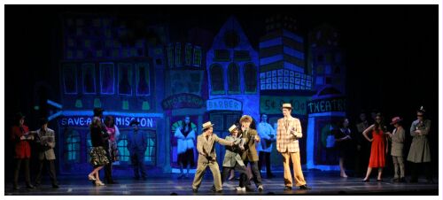 (Image: The Principles Discuss Horse Betting while the Cast
  Remains in the Background)