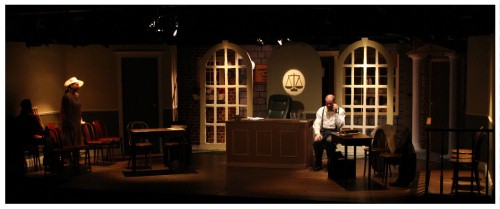 (Image: The Prosecutor's Daughter in an Empty Courtroom
  Approaches her Father to Comfort Him)