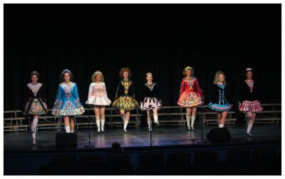 (Image: Dancers form a Row at the end of a Number)