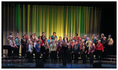 (Image: The ScotianAires in Red with Yellow and Green on the
  Back Curtain)