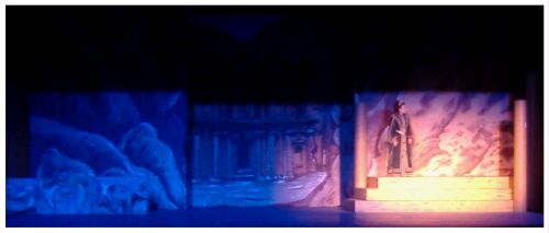 (Image: A Sole Cast Member in Straw Surrounded by Blue)