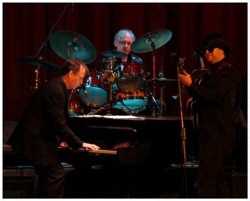 (Image: `The Pianist is Highlighted while `Roy'
 Looks on, with the Drummer seen Behind)