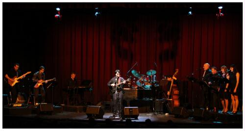 (Image: `Roy' is Highlighted as his Band
 Performs around Him)