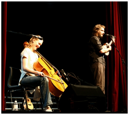 (Image: Anne, seated, Smiles as James
Speaks)