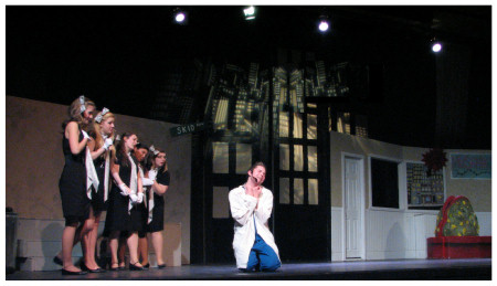 (Image: The Dentist is on his Knees, while
 the Chorus Looks On)