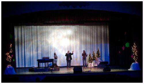 (Image: Chelsea, Duane and Julia Silhouetted on Stage)