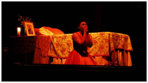 (Image: Maria Kneels beside the Bed with her Hands
 Pressed Together)