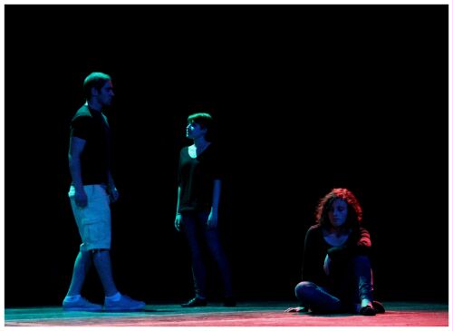 (Image: Two Actors are backlit in Aqua and
 a Third is Backlit in Pink)