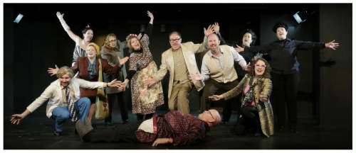 (Image: The Cast Gathers around the Corpse of
  Uncle Tony as They Continue to Relate the Story)