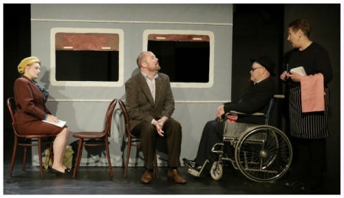 (Image: A Train Waiter Caters to Harry and
   Uncle Tony while Annabel Watches Carefully)